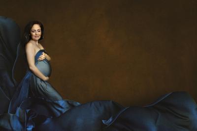 Expectant mother in blue gown