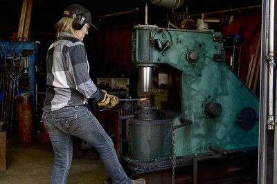 Close up of Kellan shaping steel