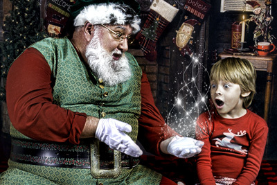 Boy in awe of Santa's magic