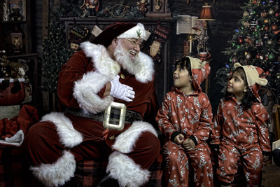 Santa laughing with kids